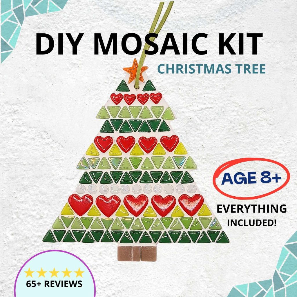 scandinavian style christmas tree with red hearts, green triangles and white circles. Mosaic on a white background.